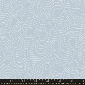 May include: Abstract pattern of white wavy lines on a light blue background. The pattern is reminiscent of ocean waves.