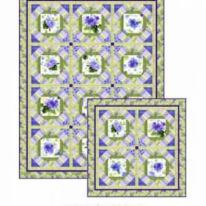 May include: A quilt pattern featuring a hydrangea flower design. The quilt is made up of squares with a light green background and a purple hydrangea flower in the center. The quilt is surrounded by a border of light purple and white squares. The text "Hydrangea Blossoms" is at the top of the image. The text "Pine Tree Country Quilts" is at the bottom of the image, along with the company's address and website.