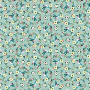 May include: A seamless pattern featuring teal blue hummingbirds with pink accents flying in a circle around a wreath of white and yellow flowers on a light blue background.