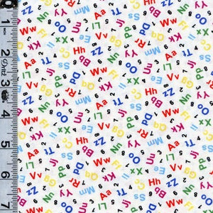 May include: White fabric with a repeating pattern of colorful letters of the alphabet. The letters are in various sizes and colors, including red, blue, green, yellow, and black.