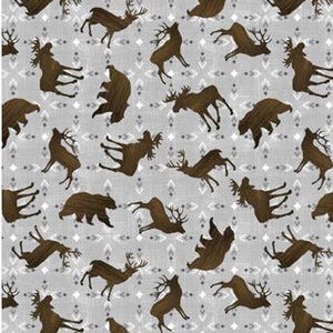 May include: A fabric pattern featuring brown silhouettes of bears, deer, and moose on a light gray background. The design includes small white and gray geometric shapes, creating a rustic, outdoorsy theme.