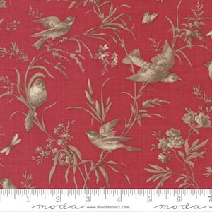 May include: Red fabric with a repeating pattern of tan birds, butterflies, and floral elements. The birds are depicted in various poses, some perched and others in flight, amidst the foliage. The fabric has a textured appearance.