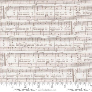 May include: Off-white fabric with a repeating pattern of musical notes and lyrics in a sepia tone. The text includes phrases like "Christ-mas tree" and "faithful are thy leaves". The fabric has a vintage, antique aesthetic.