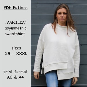 Puede incluir: Patrón PDF para una sudadera asimétrica llamada "VANILIA". El patrón está disponible en tallas XS a XXXL y en formatos de impresión AO y A4. Se muestra una sudadera blanca en una modelo.