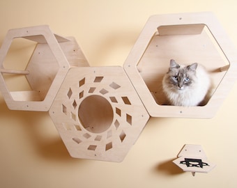 Cat's Paradise: cama hexagonal personalizada y percha de pared para máxima comodidad y exploración.