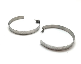 Singuliar creoles earrings hammered  stainless steel "Elig"