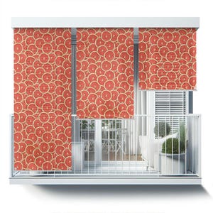 May include: Three red and white patterned window shades with a grapefruit design are pulled down on a balcony.