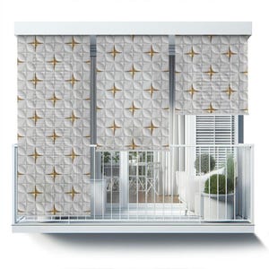 May include: White balcony blinds with a geometric pattern of gold stars and white petals. The blinds are partially rolled up, revealing a view of a balcony with white railings and a potted plant.