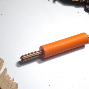 Recycled skateboard rolling pin ; Reclaimed skateboard handles and silicone roller. Vegan Friendly gift.