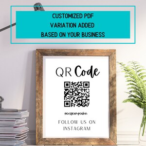 May include: A framed print with a QR code and the text "QR Code", "@cozycampcabin", and "FOLLOW US ON INSTAGRAM". The frame is made of wood. Above the frame is a teal rectangle with the text "CUSTOMIZED PDF VARIATION ADDED BASED ON YOUR BUSINESS".