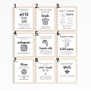 May include: Nine framed signs with black and white text and illustrations. The signs include instructions for guests, such as how to use the hot tub, how to dispose of trash, and how to use the septic system. The signs also include information about the wifi network and a reminder to keep the towels clean.