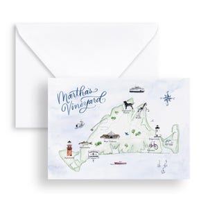 May include: Watercolor map of Martha's Vineyard with landmarks and the island's name in cursive. The map is green with blue watercolor accents and includes a white envelope.