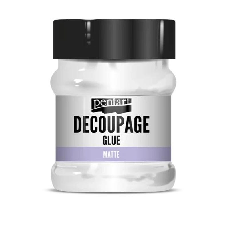 May include: A clear plastic jar with a black screw-top lid containing Pentart Decoupage Glue. The label features the brand name Pentart, the text DECOUPAGE GLUE in bold black letters, and the word MATTE printed on a light purple horizontal band.