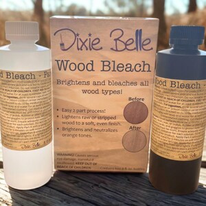 May include: An image of Dixie Belle Wood Bleach products. The image shows two bottles of wood bleach and a box with the Dixie Belle logo. The box states the product brightens and bleaches all wood types. The bottles are 8 fl. oz.