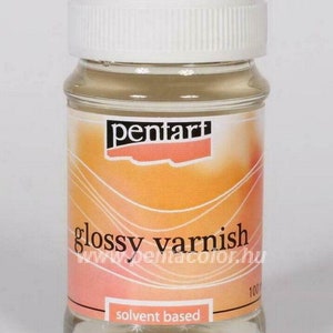 May include: A clear glass bottle of Pentart glossy varnish. The bottle is labeled with the brand name "Pentart" and the words "glossy varnish" and "solvent based".