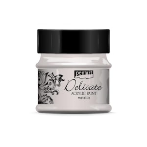 May include: A jar of "Delicate" metallic acrylic paint by Pentart. The paint is a pearlescent white color, with a black lid. The jar has a decorative floral design on the side.