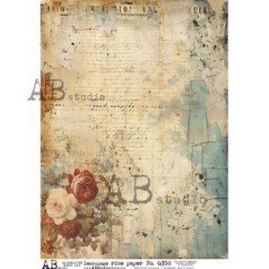 May include: Decoupage rice paper with a vintage aesthetic. The design features a faded, aged background with handwritten script, floral accents, and distressed textures. The paper has a mix of beige, brown, and blue tones, with the text "AB studio" visible.