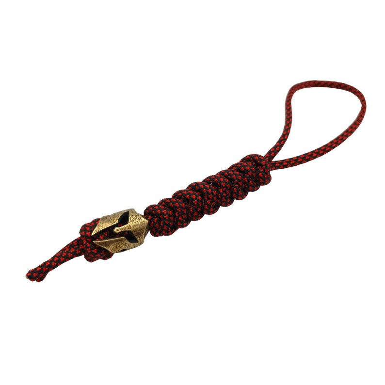 May include: A red and black paracord keychain with a brass Spartan helmet bead.