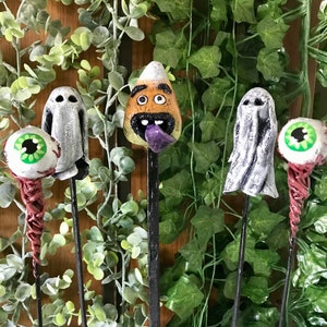Halloween themed hand sculpted plant stakes