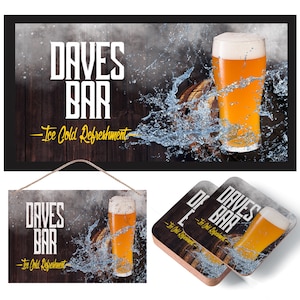 May include: A wooden sign with the text "Dave's Bar - Ice Cold Refreshment" and a glass of beer with water splashing around it. The sign is hanging from a rope.
