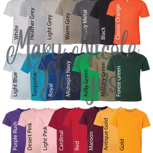 May include: A variety of t-shirt colors, including white, heather grey, light grey, warm grey, heavy metal, black, classic orange, light blue, turquoise, royal, midnight navy, kelly green, military green, forest green, purple rush, desert pink, light pink, cardinal, red, maroon, antique gold, and gold.