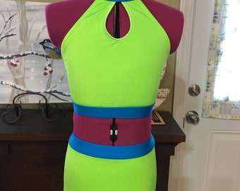 May include: A neon green halter top and matching high-waisted shorts with a blue trim. The top has a keyhole cutout in the front.