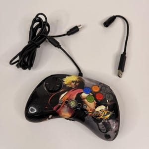 Manette inspirée de Street Fighter IV