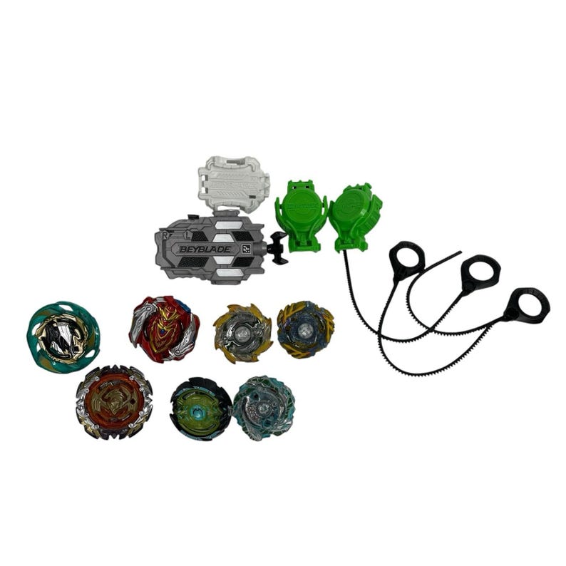 Puede incluir: Una colecci&oacute;n de juguetes Beyblade, que incluye varias peonzas giratorias en varios colores y dise&ntilde;os. El conjunto incluye lanzadores, cuerdas de tracci&oacute;n y otros accesorios. Las peonzas presentan detalles intrincados y est&aacute;n dise&ntilde;adas para el juego competitivo.
