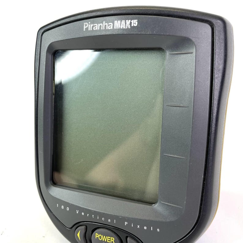 May include: A white ceramic mug with a black handle and the text "But First, Coffee" in a bold, black font. The mug is set against a neutral background, highlighting its simple design.