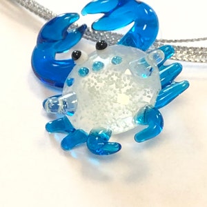 Beautiful blue and clear glass crab pendant necklace! Wonderful detail on the crab.