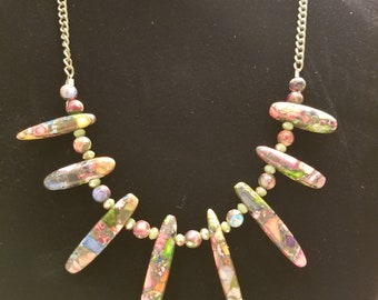 Multi-colored stones with bronze necklace