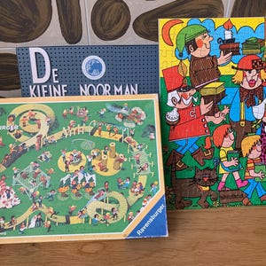 Vintage set of 2 puzzles /  150 pieces funny Puzzle Ravensburger  Ali Mitgutsch - made in Western Germany / keep fit