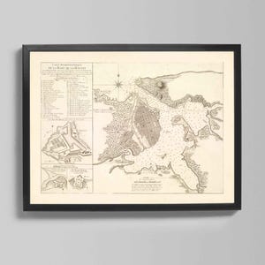 Może przedstawiać: Oprawiona mapa vintage La Habana, Kuba, w odcieniach sepii. Mapa zawiera szczegółowe ilustracje miasta, linii brzegowej i okolic, z tekstem w języku francuskim. Mapa jest oprawiona w czarną ramę.