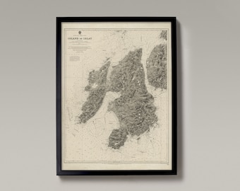 May include: A vintage black and white map of the Island of Islay, Scotland. The map is framed in a black frame and is printed on cream-coloured paper.