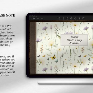 Puede incluir: Una tableta digital que muestra una descarga PDF para un "Diario de fotos diario anual". La portada del diario presenta un patr&oacute;n floral con mariposas y el texto "Diario de fotos diario anual". La tableta est&aacute; sobre una superficie blanca con un l&aacute;piz blanco.