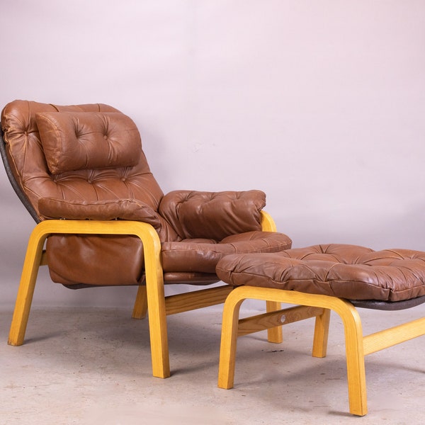 Vintage Danish leather and bentwood Model 180 lounge chair and footstool from Cado (France & Søn)