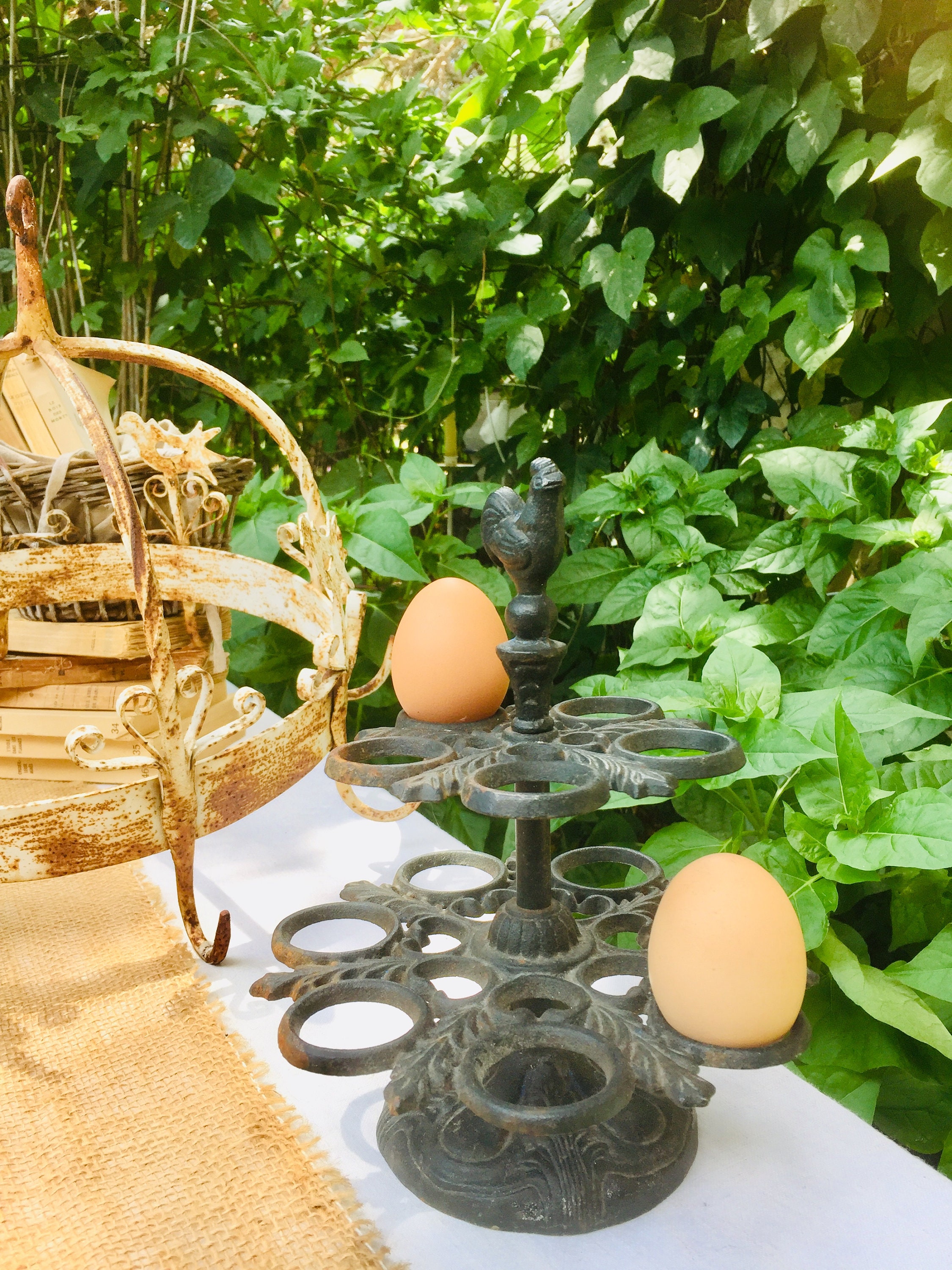 French vintage egg rack, cast metal hen decorated egg display stand
