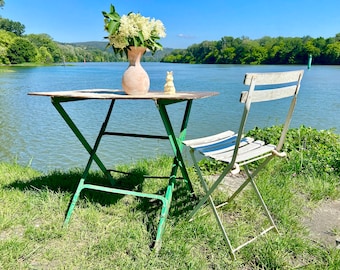 Vintage French patio table, large size faded green foldaway iron garden table with a gorgeous white distressed top, authentic aged patina