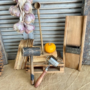 Set of 4 items, 1 long olive scoop, 1 pasta cutter, 1 antique meat tenderizer and mandoline cabbage and veg slicer, rustic farmhouse kitchen