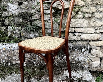 Antique French bentwood bistro chair, caned seating, one authentic Baumann café chair, circa 1920’s. We cover all your US import duties