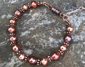 Bracelet Features Copper Freshwater Pearls, Copper-Colored Brass Beads, Antique Copper Rondelle Beads and a Magnetic Clasp