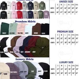K&ouml;nnte beinhalten: Eine Auswahl an Kapuzenpullovern und Sweatshirts in verschiedenen Farben, darunter Schwarz, Wei&szlig;, Rosa und Rot. Das Bild enth&auml;lt Gr&ouml;&szlig;entabellen f&uuml;r Unisex-, Premium- und Luxushemden mit Breiten- und L&auml;ngenma&szlig;en in Zoll.