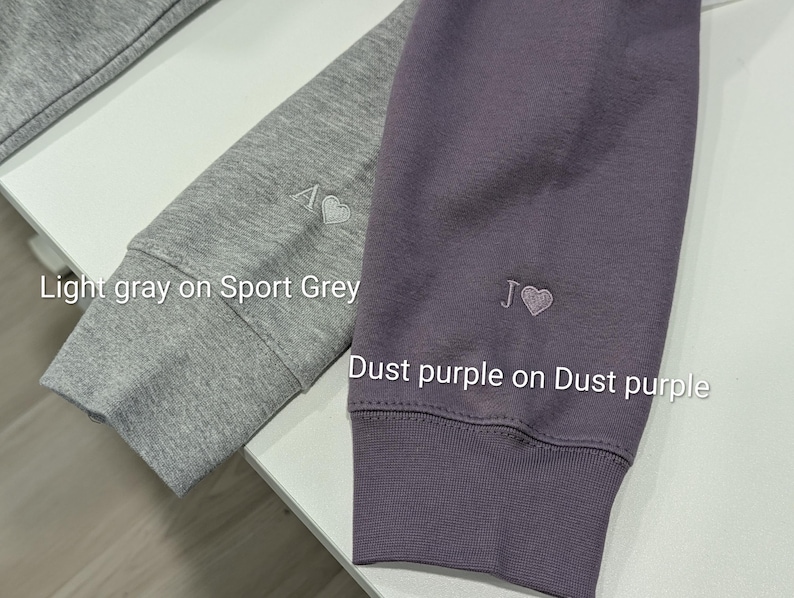 couples matching initial hoodies with a heart
