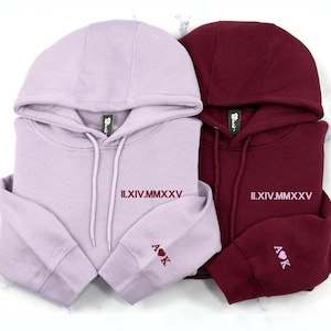 anniversary sweatshirt for couples with Roman Numeral Date on the chest and couples initial and a heart on the sleeve