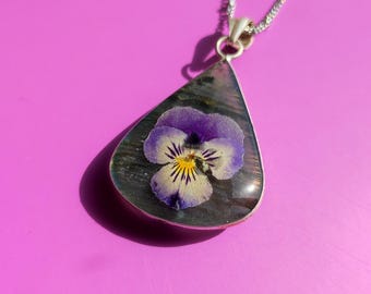 Pansy flower preserved in resin on Labradorite. One of a kind Botanical Keepsake Necklace