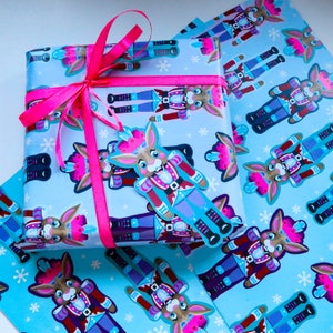 Pacote de embrulho de presente de Natal de coelho quebra-nozes com 2 folhas