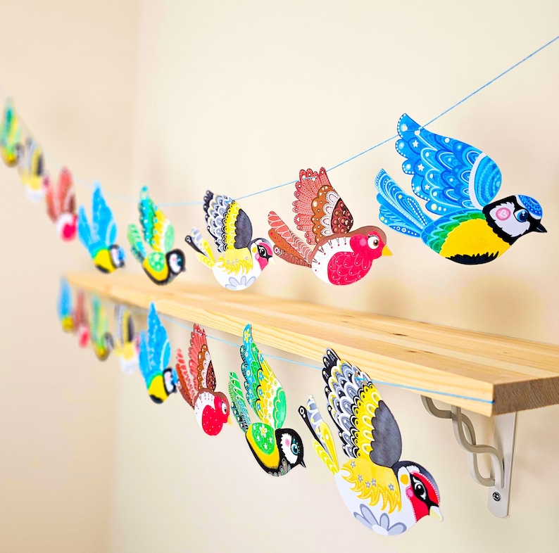 Handmade English garden birds bunting garland hanging on wall