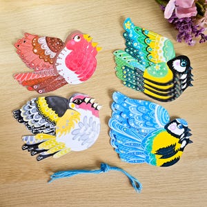 Colourful paper bunting with robins goldfinches and blue tits
