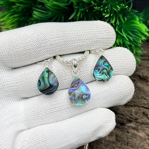 Smyckeset med abalone-snäckskal, pläterat i 925 sterlingsilver, silverhänge och örhängen