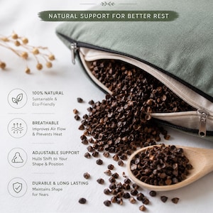 May include: A sage green pillow partially unzipped, revealing dark brown buckwheat hulls spilling out. A wooden spoon holds a small pile of hulls. Text reads: FILLED WITH NATURAL BUCKWHEAT HULLS, NATURAL SUPPORT FOR BETTER REST, 100% NATURAL, BREATHABLE, ADJUSTABLE SUPPORT, DURABLE & LONG LASTING, A HEALTHIER, MORE COMFORTABLE WAY TO REST NATURALLY.